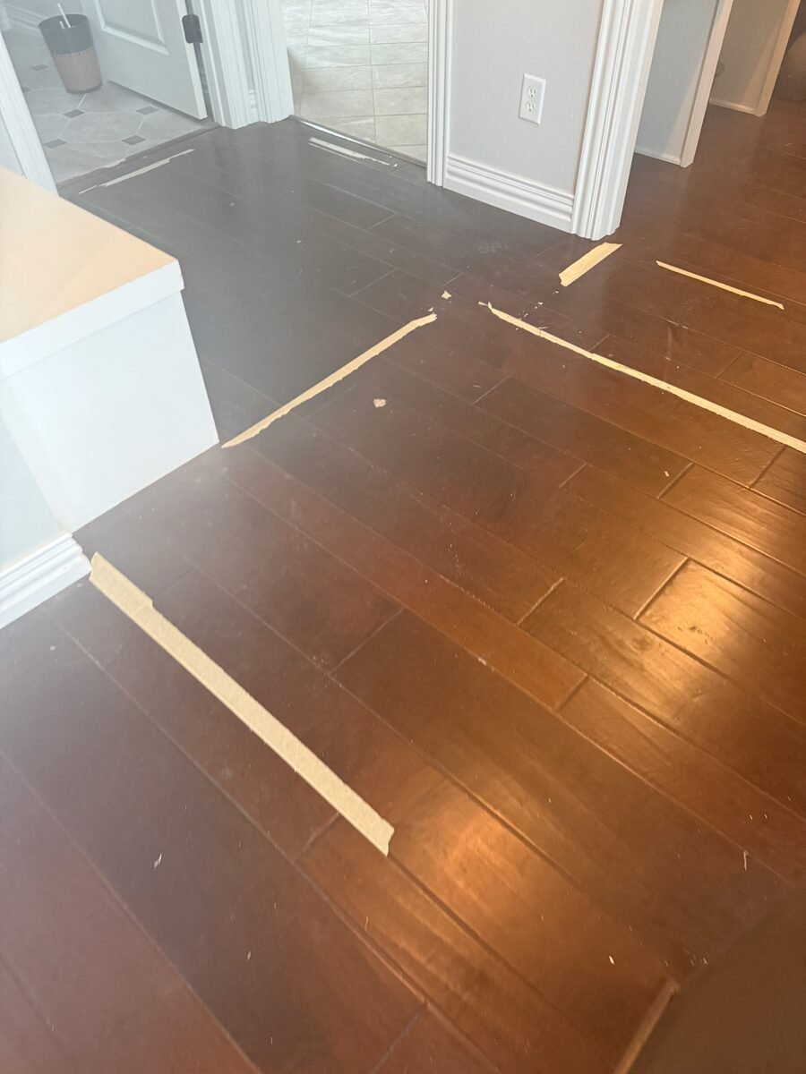Dark hardwood cleaned to an even sheen along the skirting