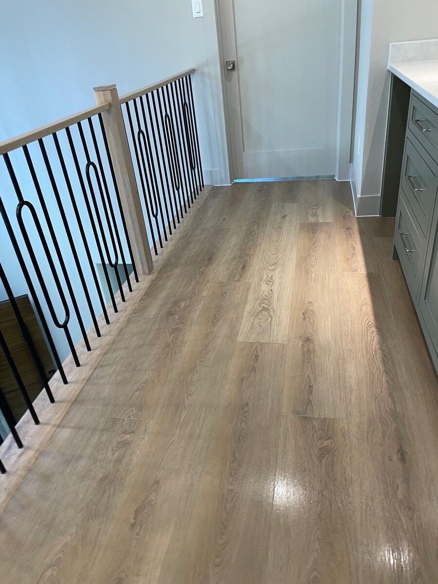 clean plank flooring on an upstairs landing in a Coppell home cleaned by SusyQ’s Cleaning